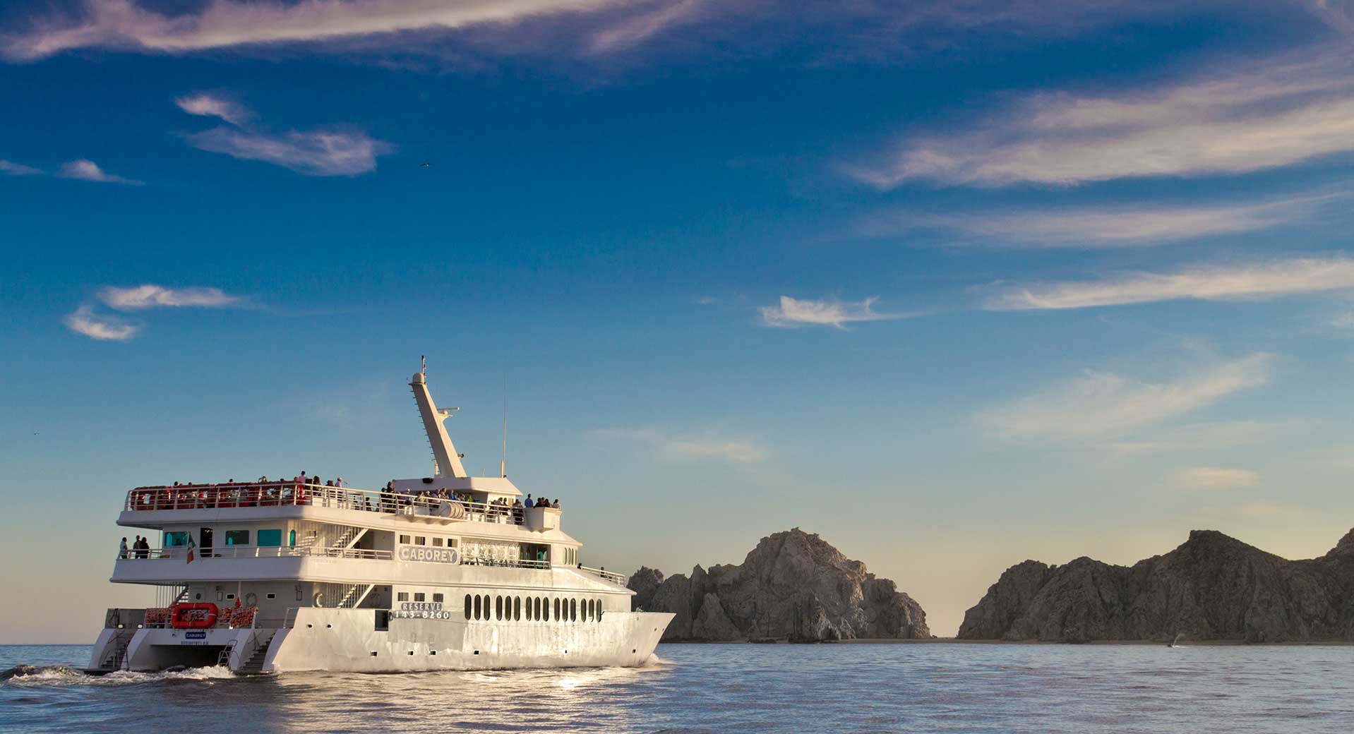 The Cabo Rey tourist cruise boat makes its way to Land's End in Cabo