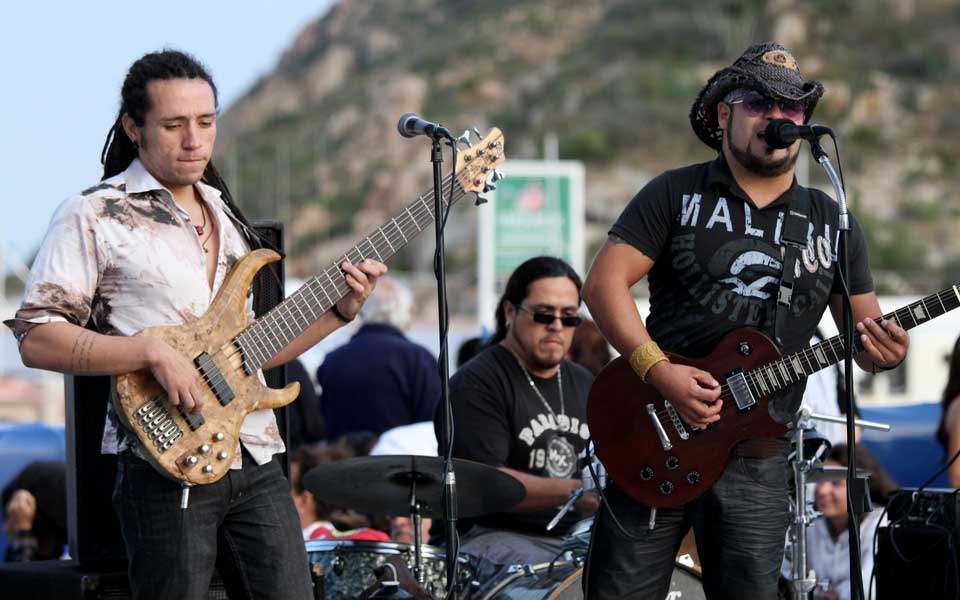 Live bands perform on the upper deck of the Cabo Rey