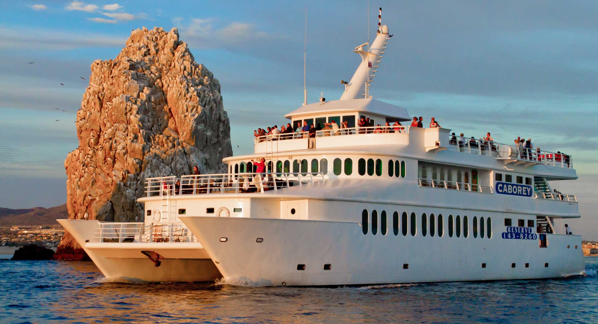 Cabo Rey passes Land's End on its Sunset Premier Dinner and Show tour in Cabo San Lucas